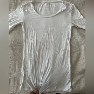 Three white tshirts different brands